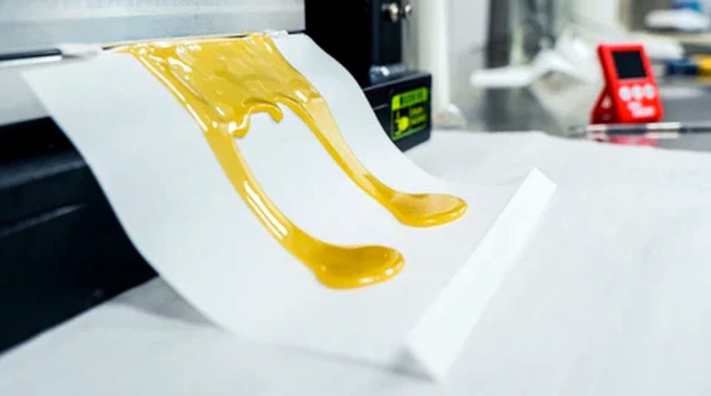Extraction rosin cannabis concentré CBD pressé à chaud sur papier cuisson – fabrication résine cannabis guide Hash CBD Genève 2026